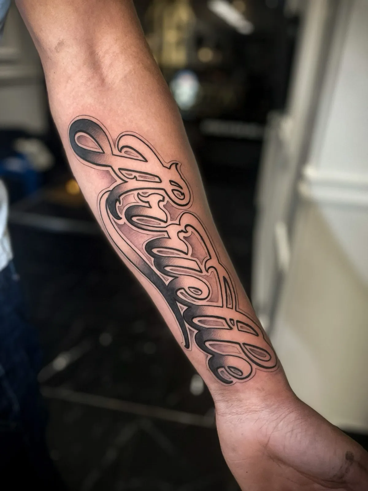 Lettering tattoo at Tattoo Heaven